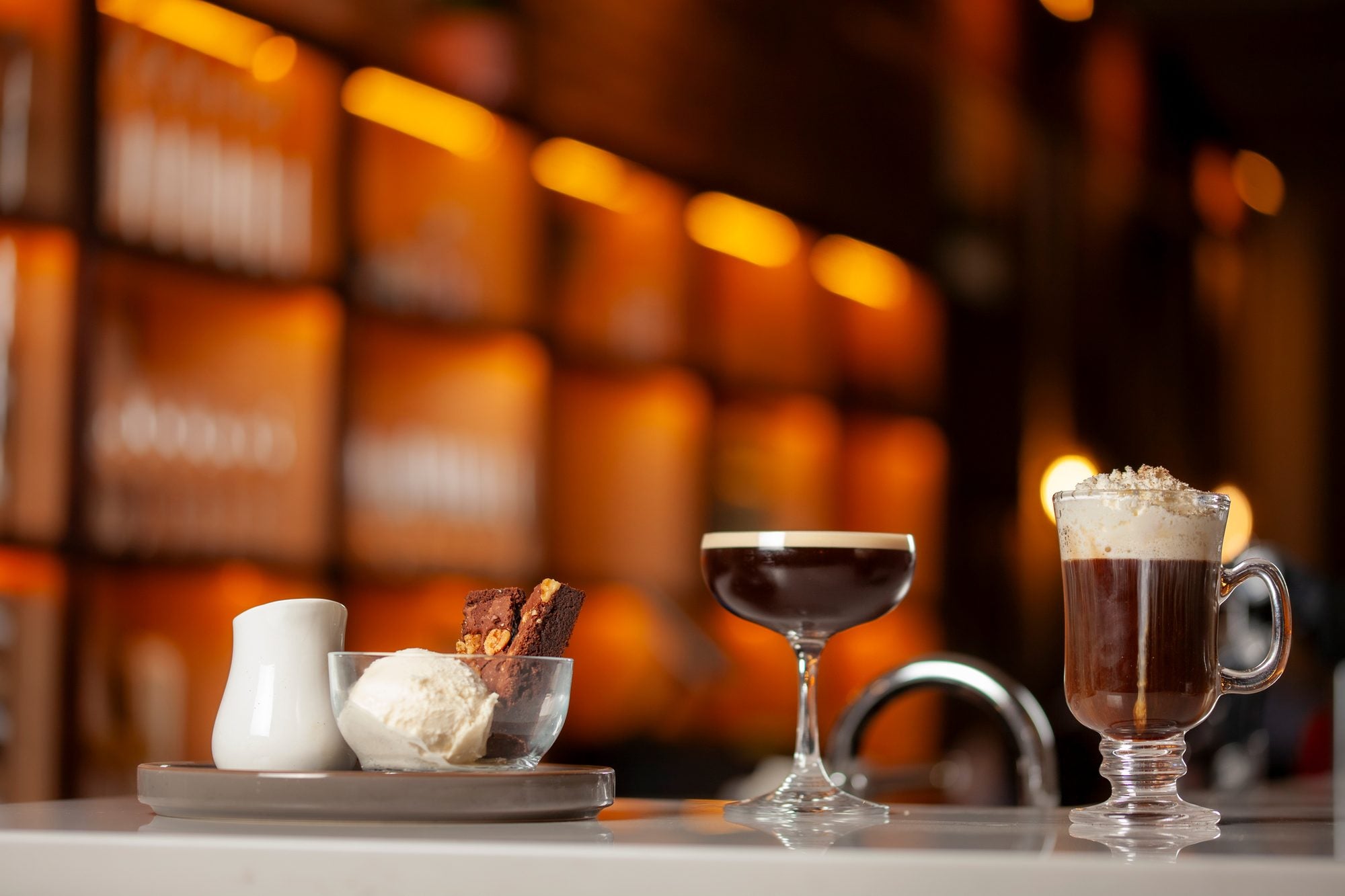 Dessert and zero proof cocktails on the bar at No More Cafe