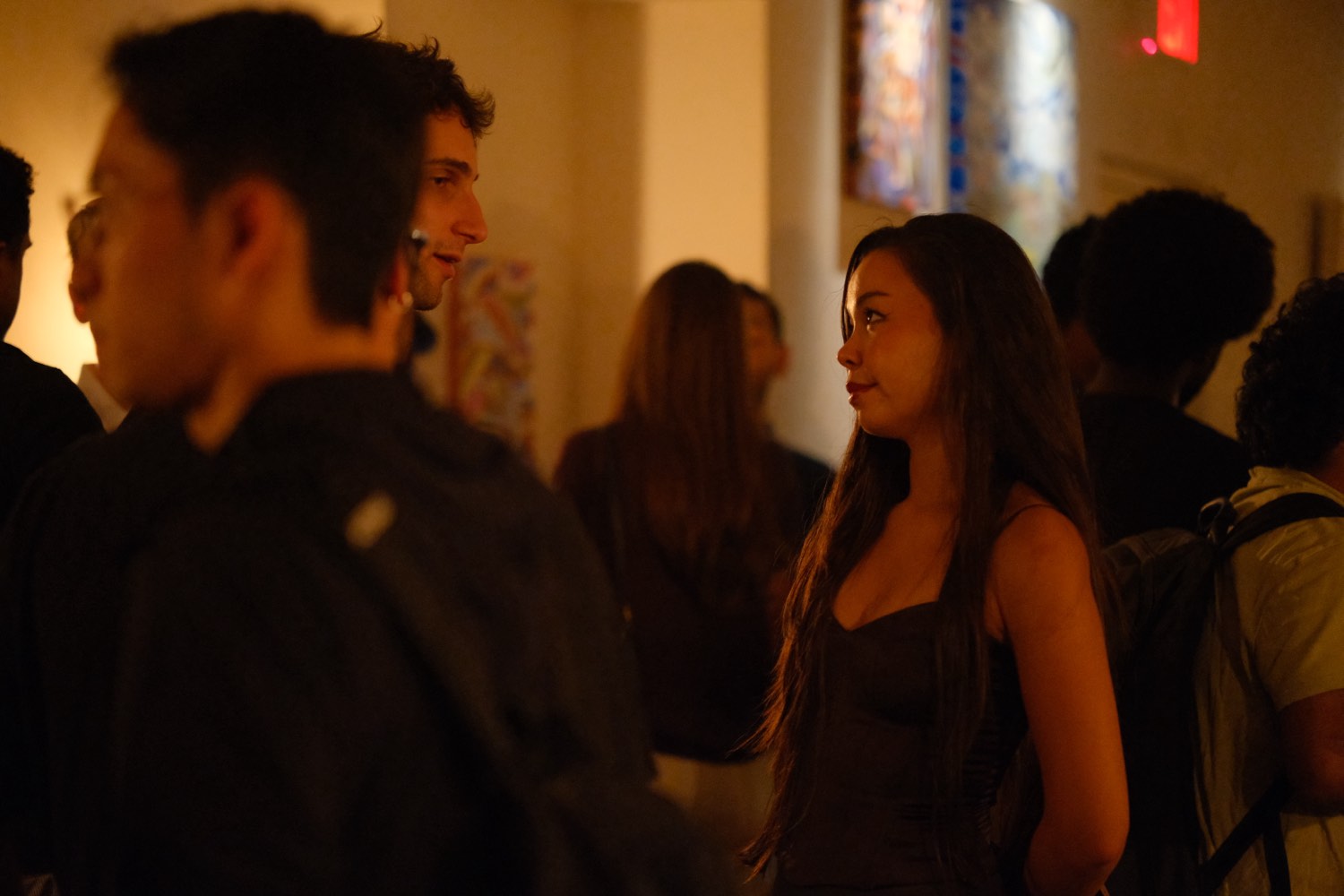 Guests at an art night at No More Cafe