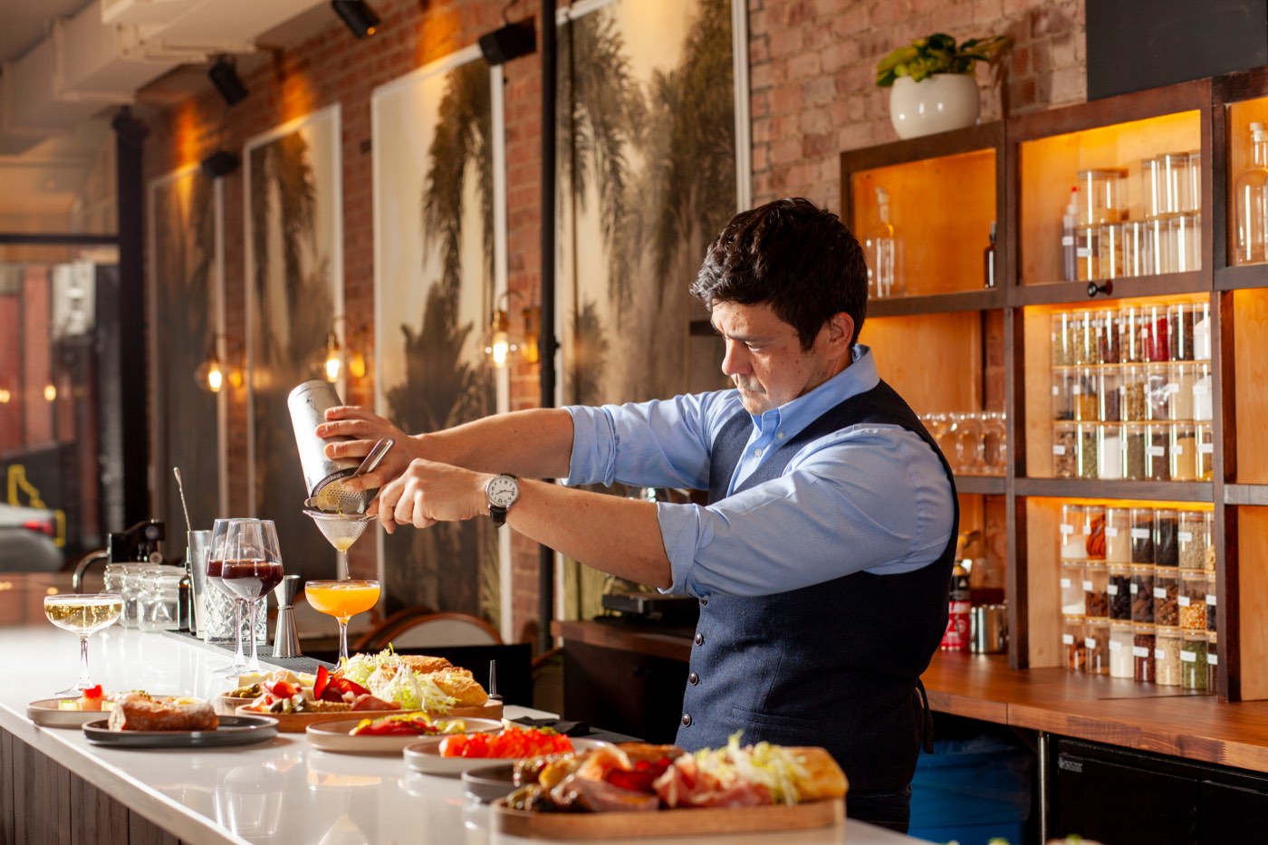 Rodrigo Nogueira making a cocktail at No More Cafe